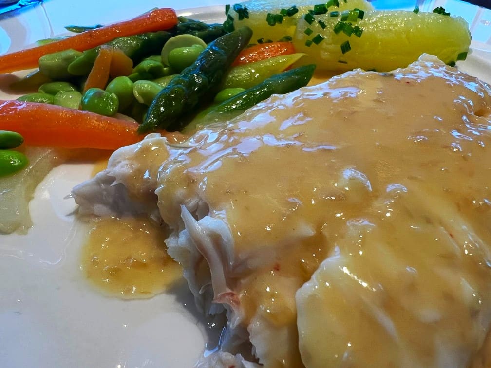 Local Halibut in a Salt Crust with a Beurre Blanc sauce - Photo by Goldring Travel