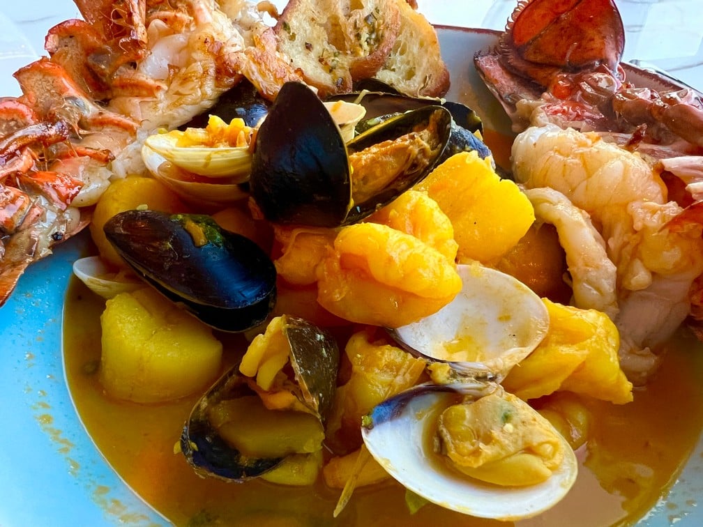 Fresh North Sea Lobster Tails and Bouillabaisse - Explora I's Emporium Marketplace - Photo by Goldring Travel 