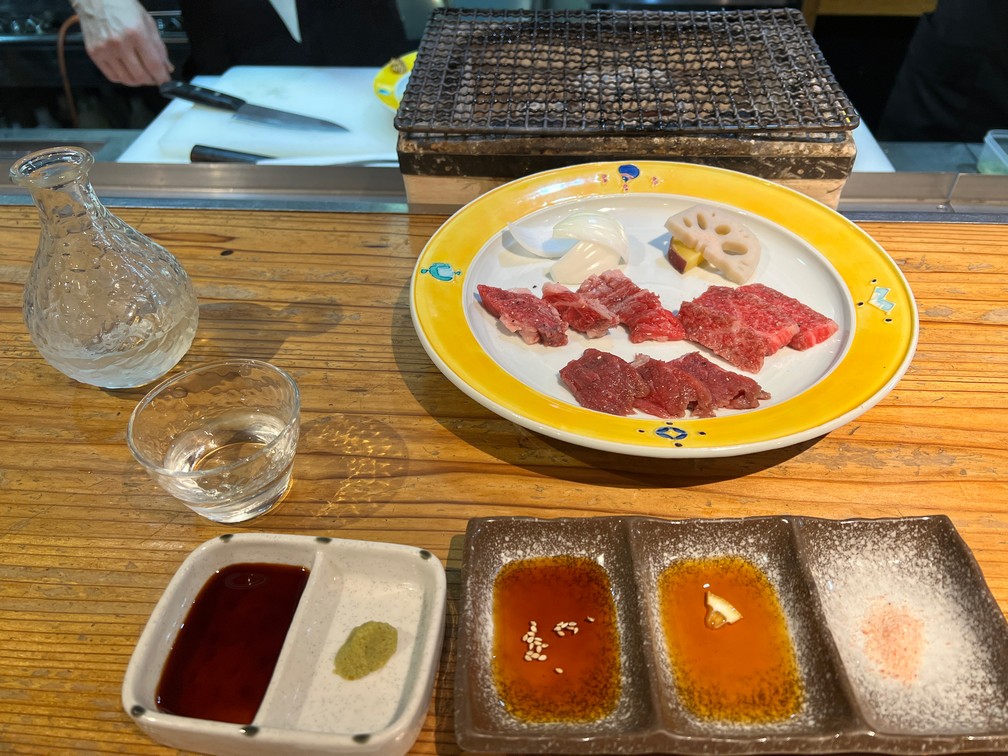 Omi "Sampler" of back, chest, and leg with three sauces + sauce...and Sake
