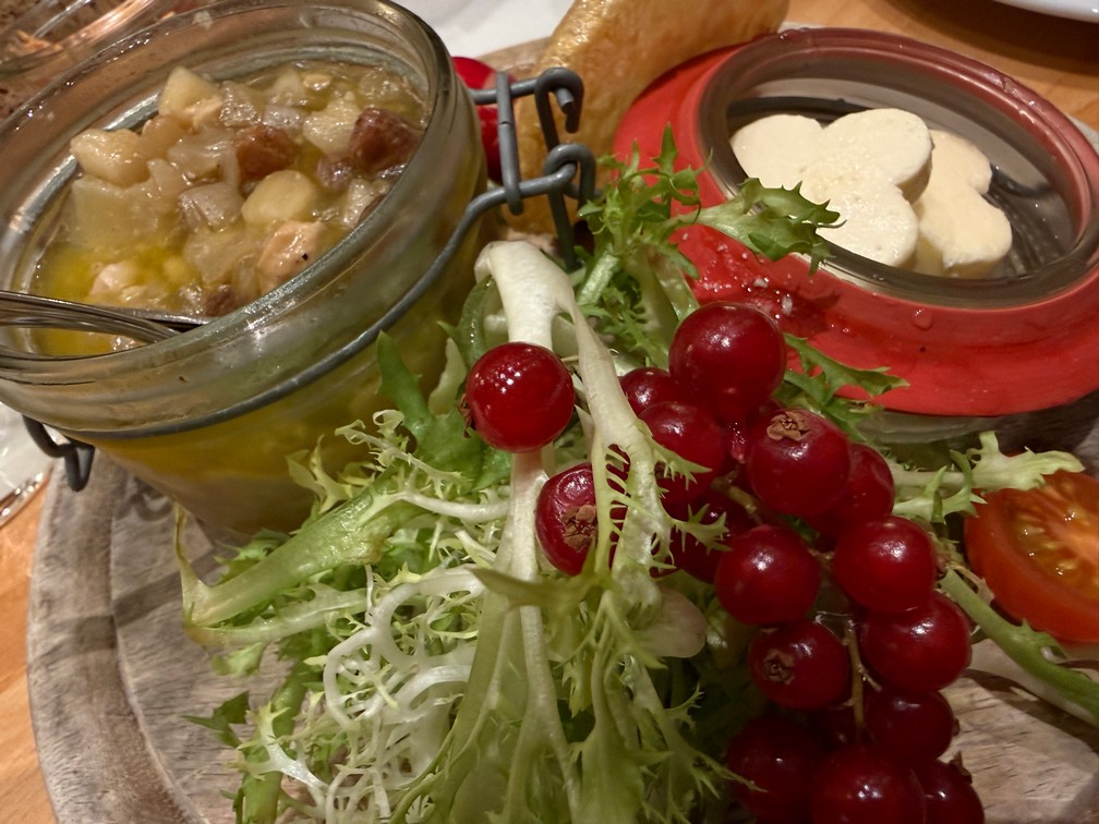 Handkäs‘ mit „Rheingauer Musik: Local cheese marinated in Riesling vinegar with apples, nuts, raisins, onions, bread, butter.