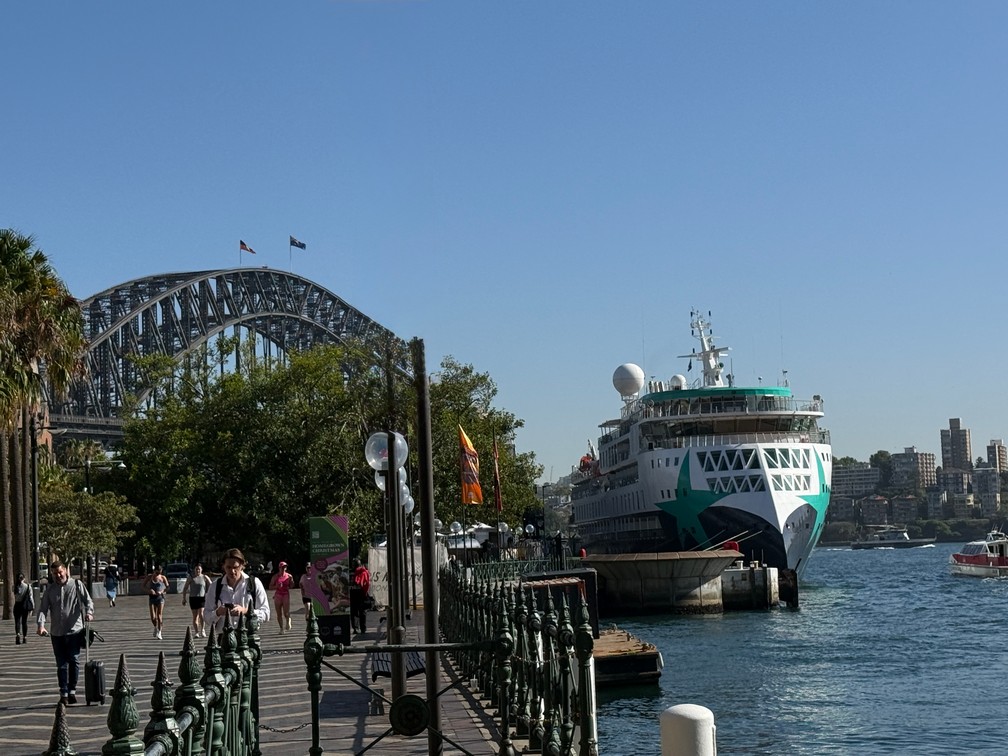 Aurora Expeditions' Douglas Mawson docked at Circular Quay, Sydney, Australia with the Sydney Harbour Bridge in the background