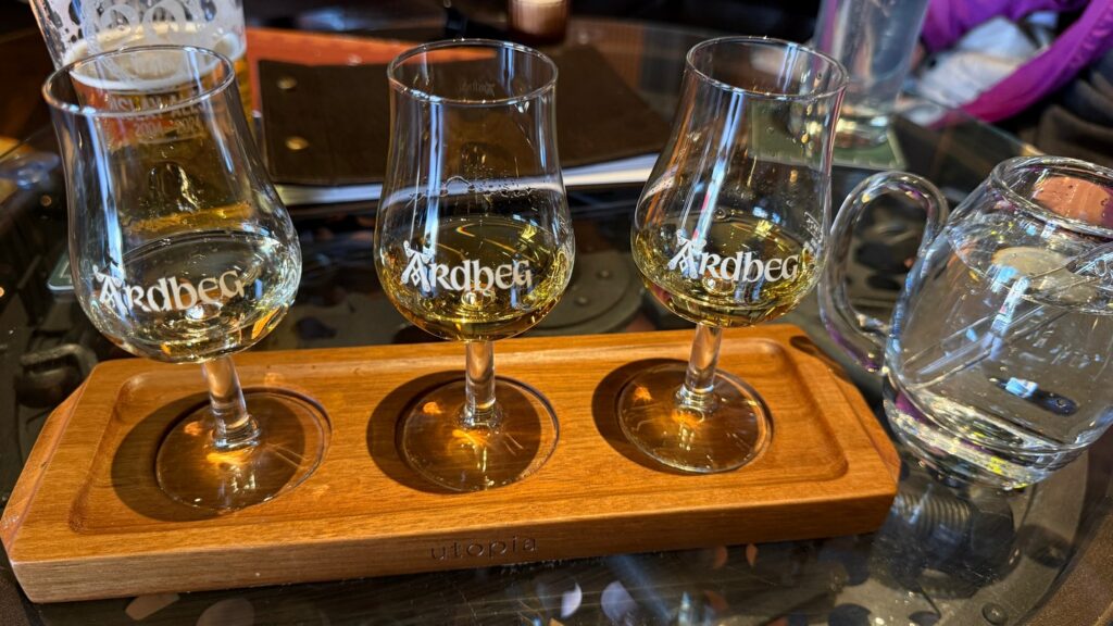 One of three Scotch whisky tastings. (Note the pitcher of water with a pipette for you to measure the amount of water you desire to open up the flavors.)