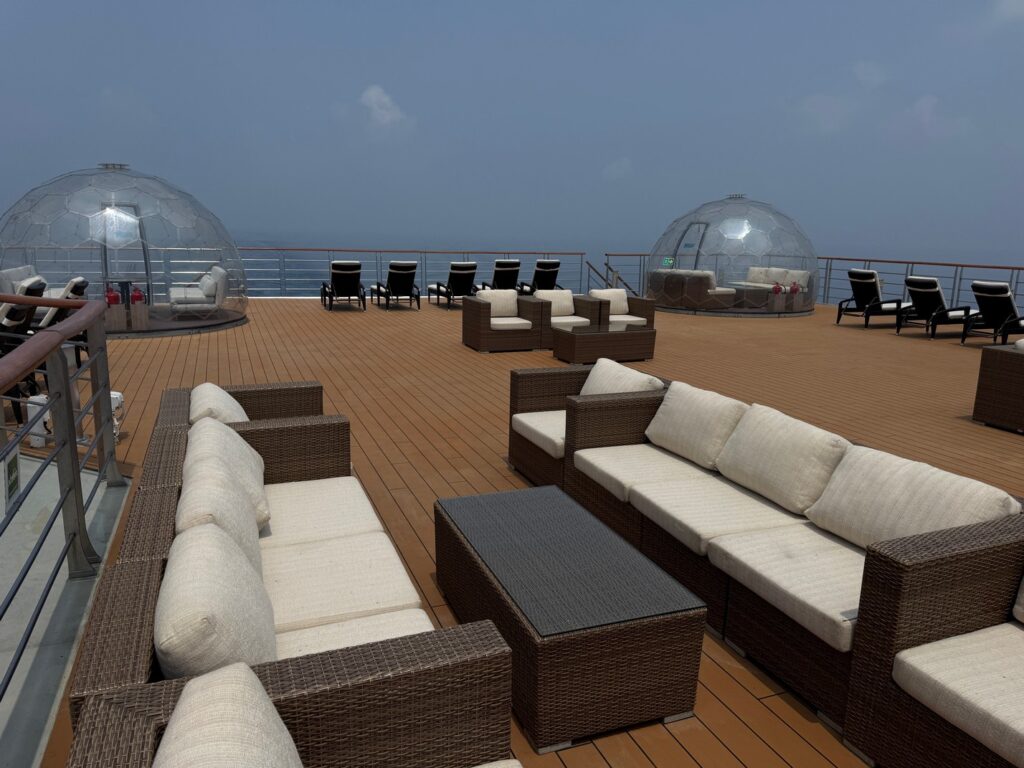 Greg Mortimer's outdoor lounge area. The two geodesic domes are fun places to keep warmer in the polar regions; not so much in Indonesia.